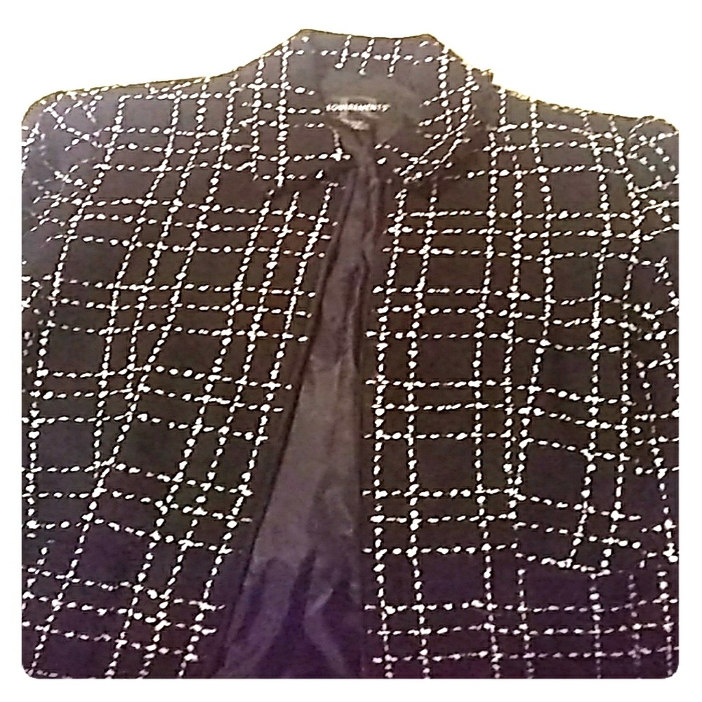 Cute black jacket with white stitching.